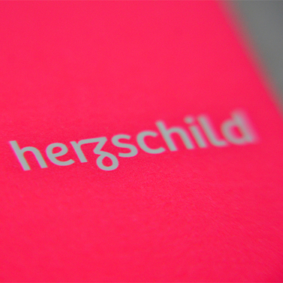 herzschild Logo